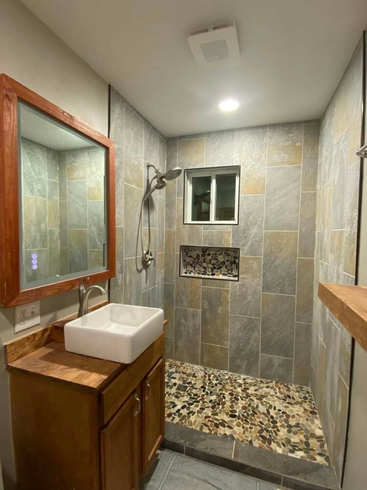 rustic-pebble-shower-bathroom-juroc
